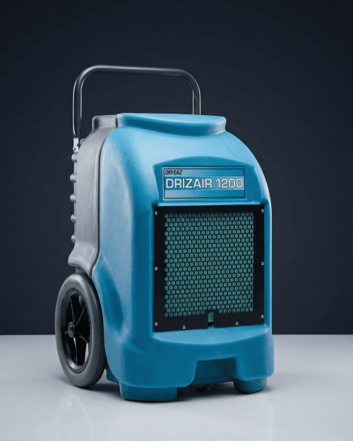 Dri-Eaz DrizAir 1200 55L industrial dehumidifier drying a commercial workspace