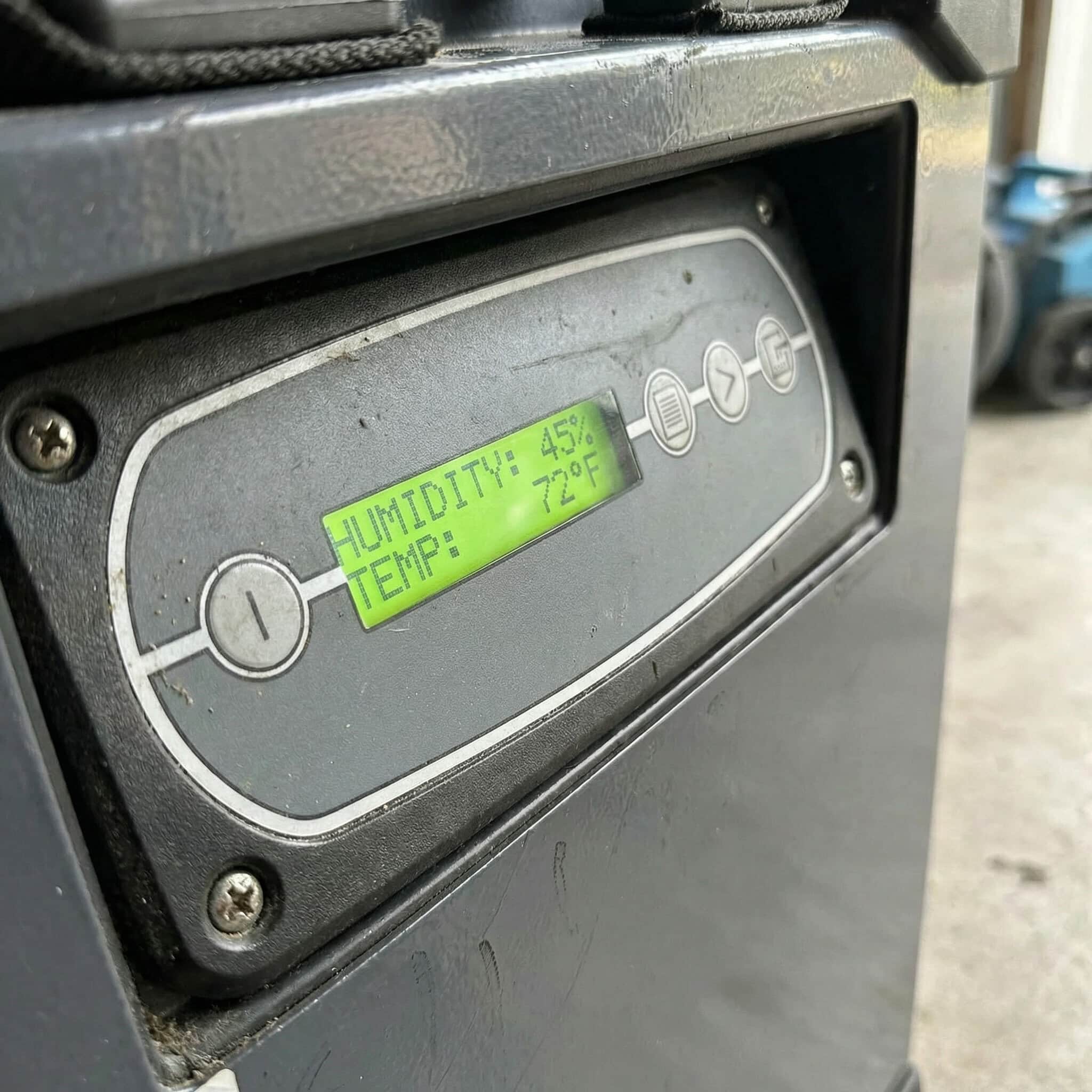 Dri-Eaz Cube Dehumidifier Hire London | Compact Professional 43L (F571) 6 Dri-Eaz Cube F571 dehumidifier digital control panel showing humidity and temperature readings on hire unit