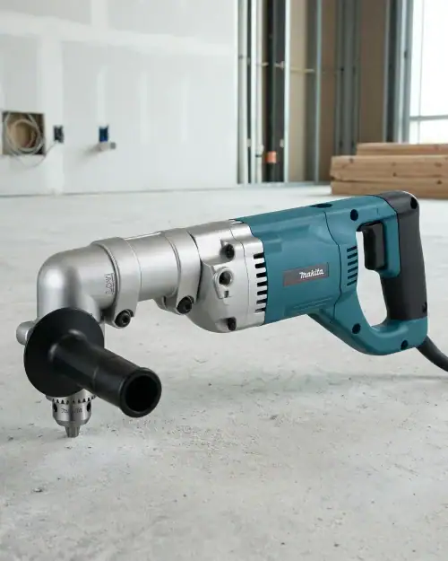 Makita DA4000LR right angle drill hire London shown in construction room with 13mm rotary chuck