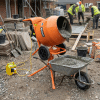 Concrete Mixer Hire London | 4/3 Cement Electric Mixer (110V or 240V) 9 Compact Belle Minimix 150 electric cement mixer 90L with 110V transformer on studio background - Concrete Mixer Hire London