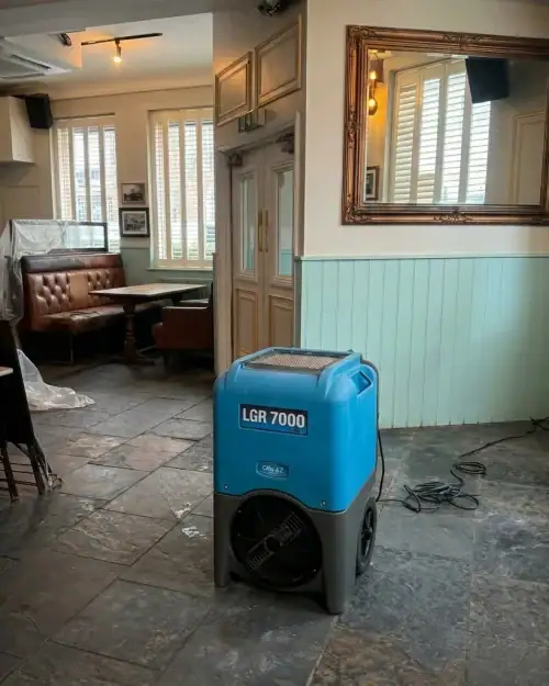 Industrial Dehumidifier Hire London | 230V Building Dryer (95L) 8 Industrial dehumidifier drying package set up inside a pub for commercial water damage drying hire London