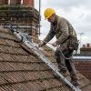 Roof Ladder Hire London – Pitched Roof Access Ladder with Ridge Hook (Trade Grade) 4 Professional ladder access equipment used safely on a commercial site with proper setup and safety measures. - Roof Ladder Hire