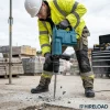 Medium Duty Breaker Hire London | SDS Max Demolition Hammer (11kg Class) 13 Worker in hi-vis and hard hat operating Bosch SDS Max medium duty breaker hire on outdoor London construction site