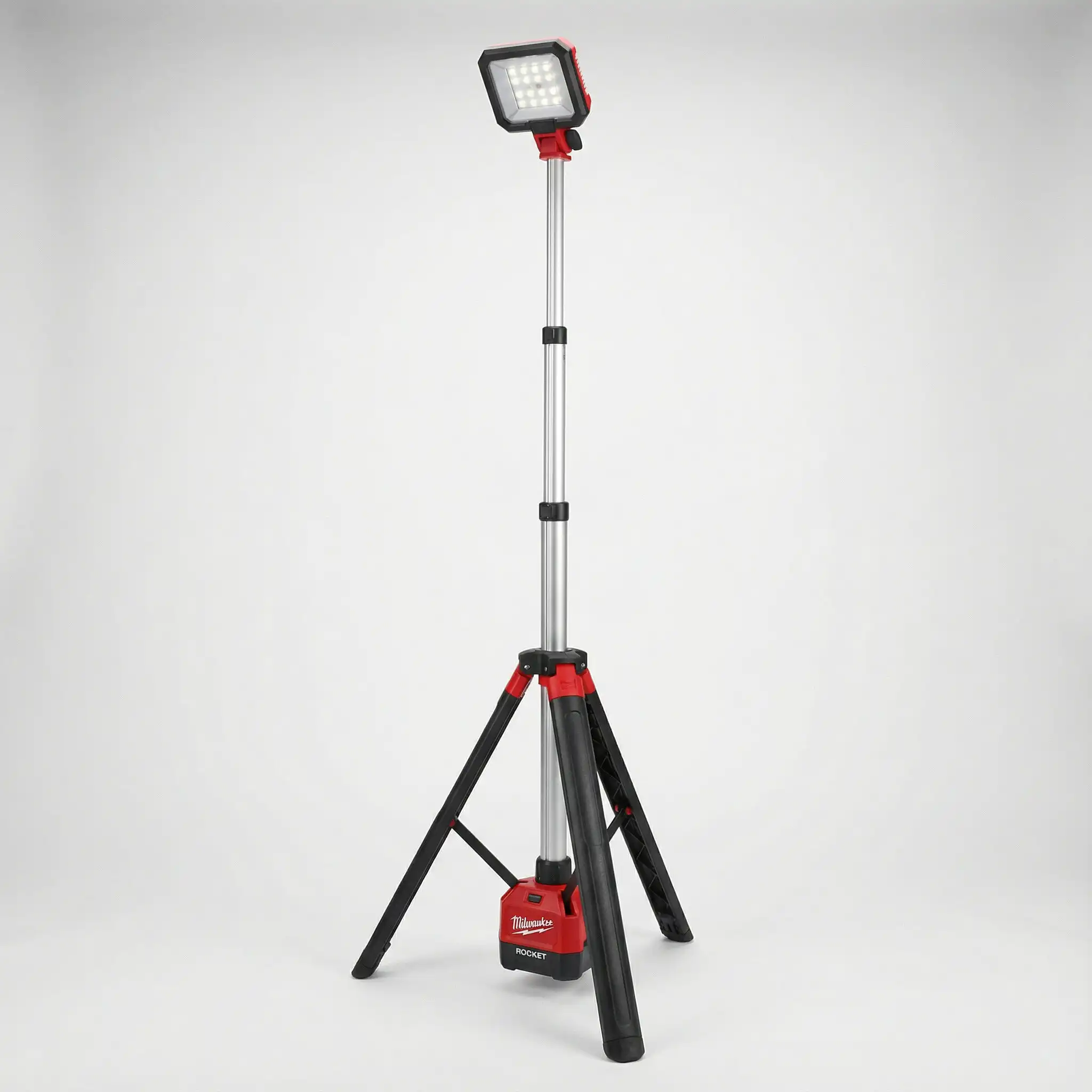 LED Tripod Work Light Hire London | Milwaukee Single-Head Site Light 2 Milwaukee M12 cordless ROCKET stand light fully extended on tripod for site lighting