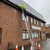 Triple Extension Ladder Hire London – Professional 3m to 7m 5 Trade extension ladder positioned against a residential building for exterior repair and access work. Extension Ladder Hire London with Hireload.
