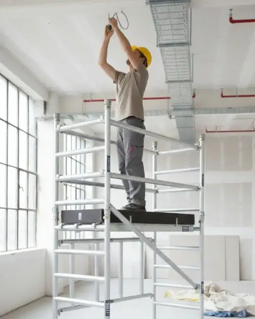Trade folding scaffold tower hire shown folded for easy transport and storage